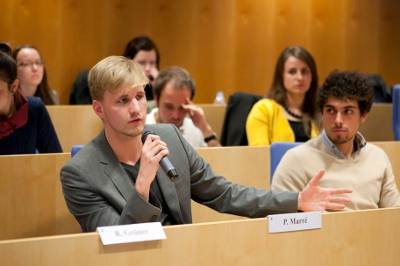 Two students speaking at moot