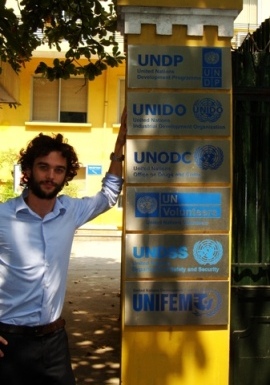 Nicola posing in front of UN signs