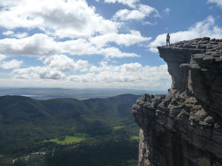 Student on rock formation