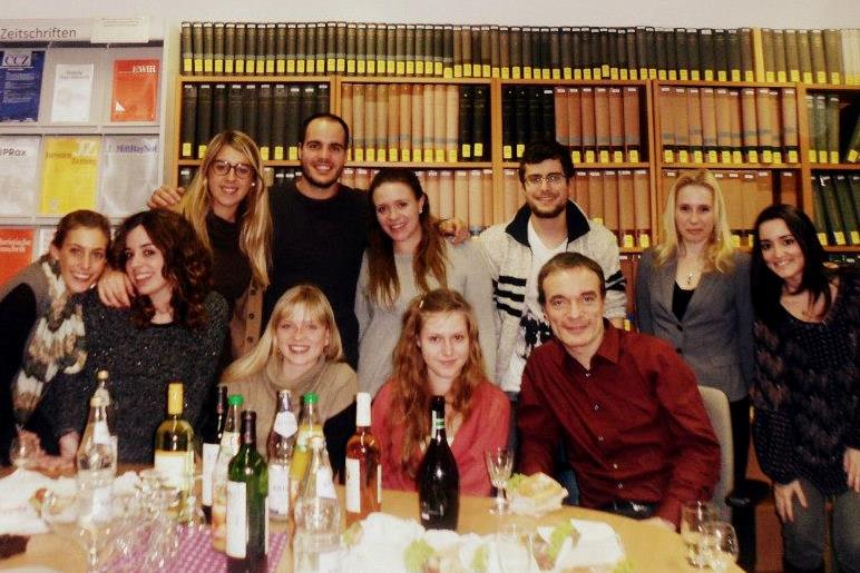 Group in front of bookcase