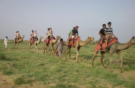 Students on a camel caravan
