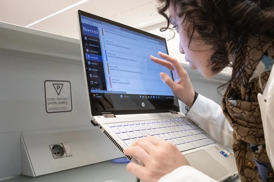 Student using computer tool for low vision