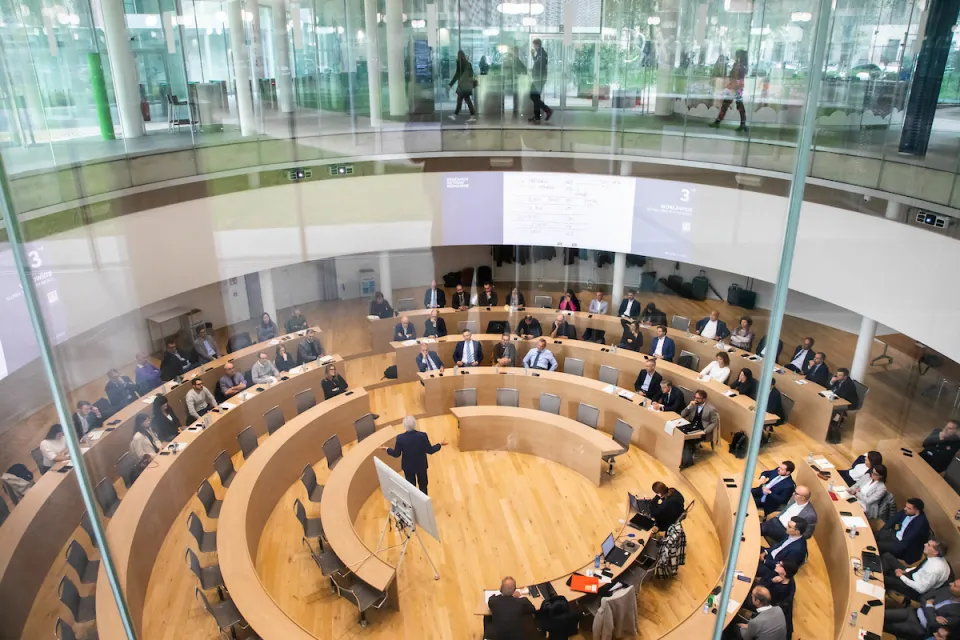 An overhead view of a class in the SDA Bocconi School of Management Auditorium.